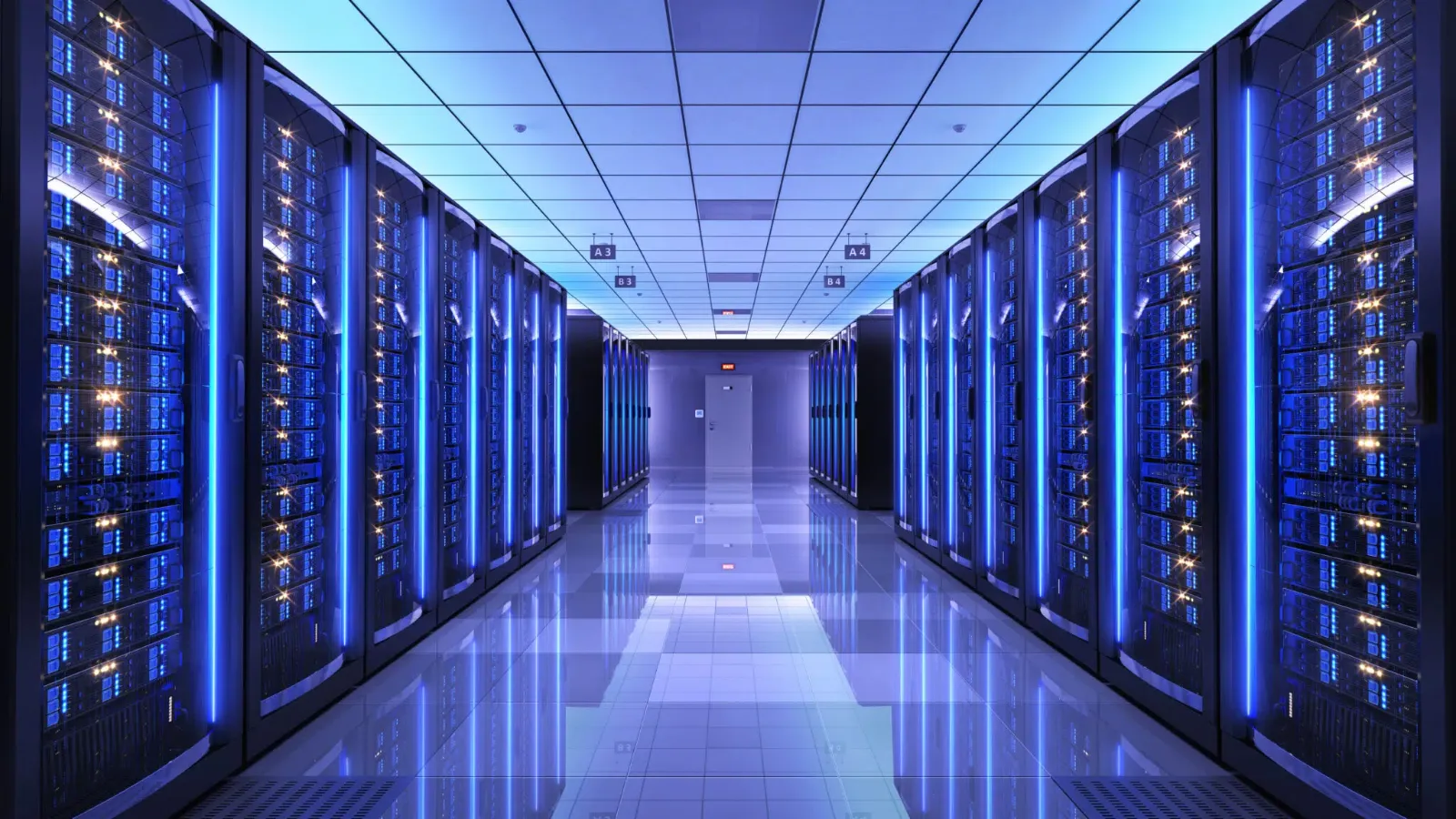 Data centre server hall with rows of server racks